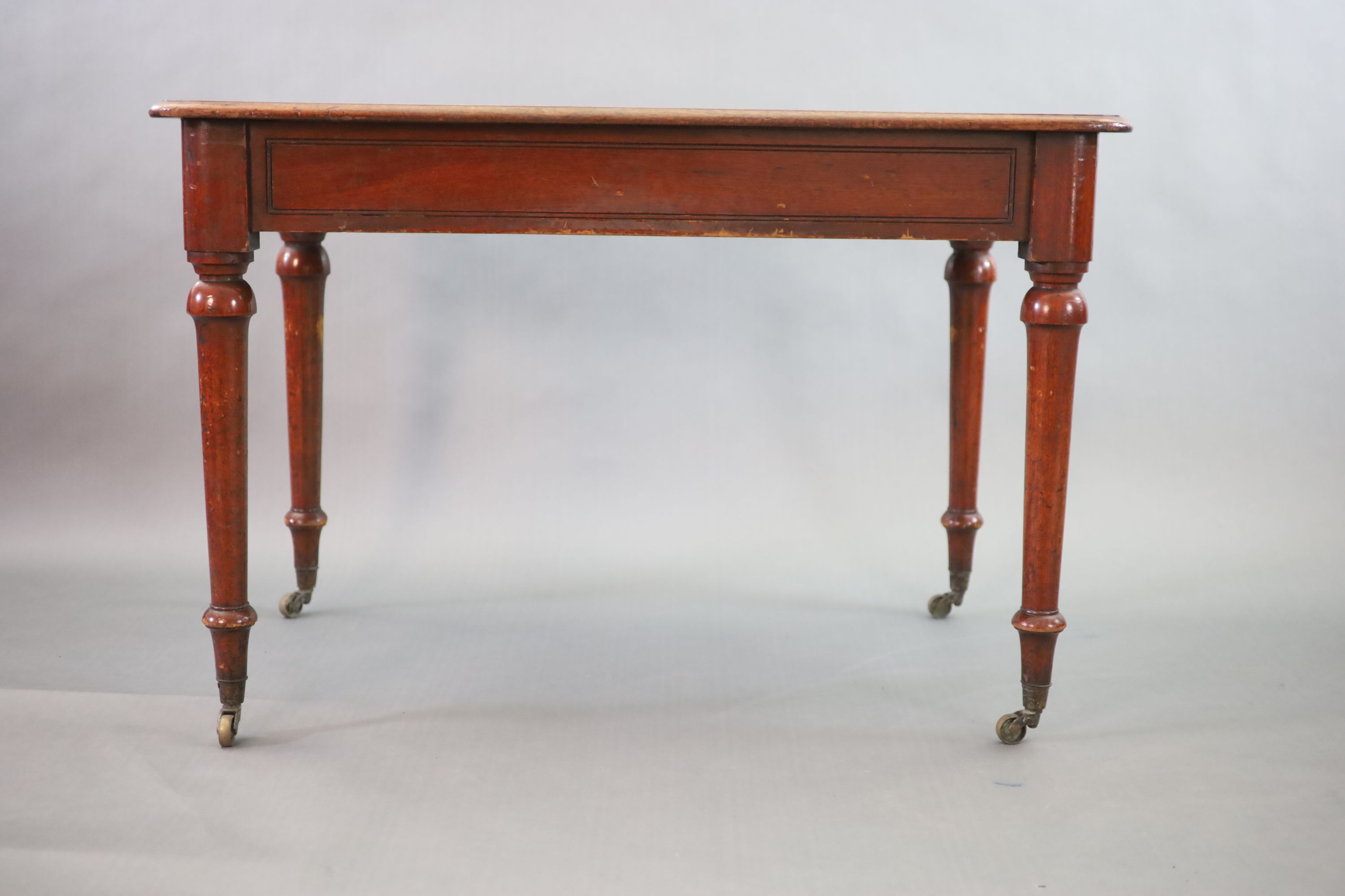 A Victorian mahogany writing table, W.114cm D.70cm H.77cm